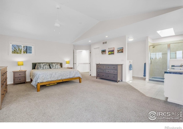1067 W Alder St, Louisville, CO 80027 - carpeted bedroom featuring a skylight, lofted ceiling, and recessed lighting