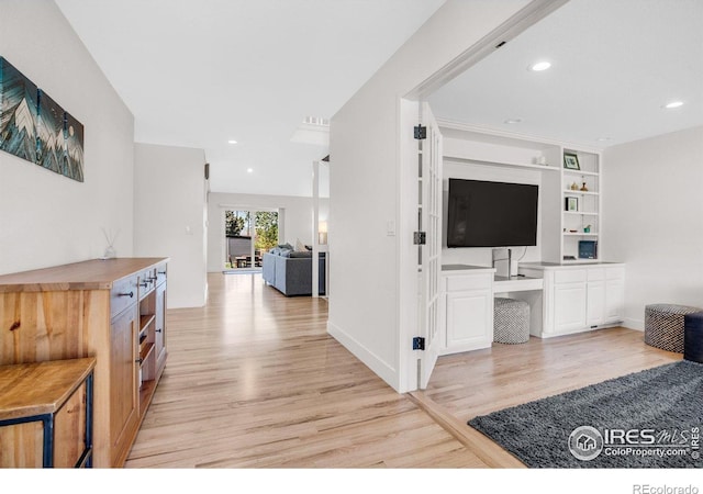 1067 W Alder St, Louisville, CO 80027 - living area with light wood-style flooring, built in shelves, and recessed lighting