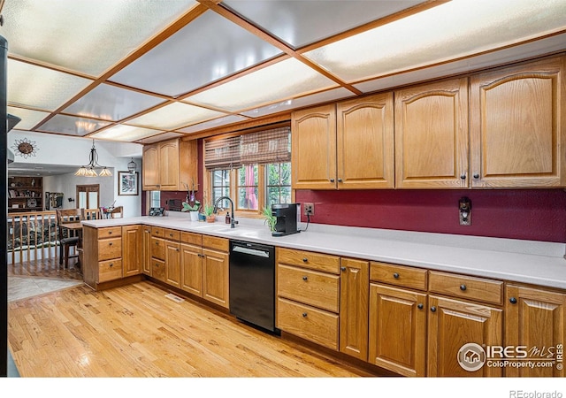 514 Palisade Mountain Dr, Windsor, CO 80550 - kitchen featuring dishwasher, a sink, light wood-style floors, and light countertops
