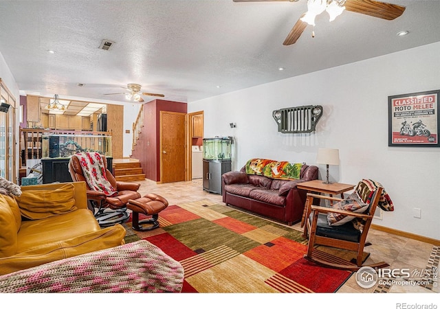 514 Palisade Mountain Dr, Windsor, CO 80550 - living area featuring ceiling fan, stairway, a textured ceiling, and baseboards