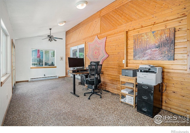 514 Palisade Mountain Dr, Windsor, CO 80550 - office with baseboard heating, carpet flooring, vaulted ceiling, ceiling fan, and wooden walls