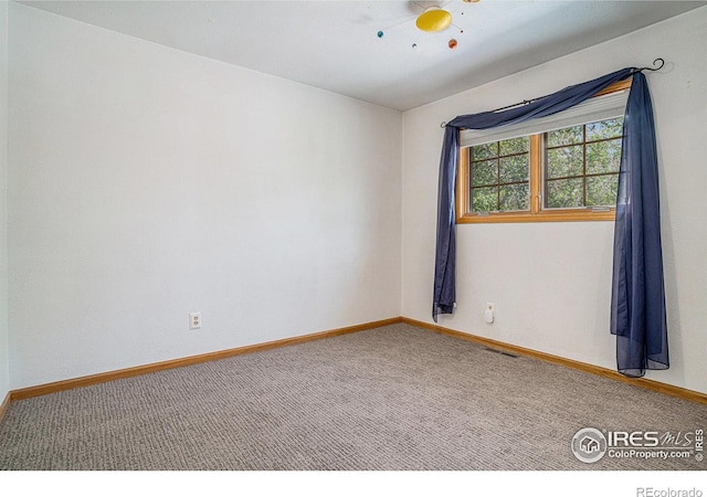 514 Palisade Mountain Dr, Windsor, CO 80550 - carpeted empty room featuring baseboards