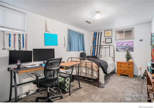 514 Palisade Mountain Dr, Windsor, CO 80550 - bedroom featuring a textured ceiling, an office area, baseboards, and carpet flooring