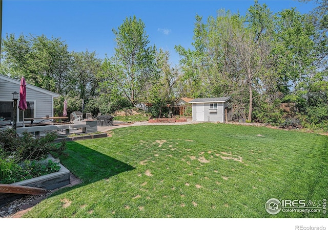 514 Palisade Mountain Dr, Windsor, CO 80550 - view of yard featuring a deck