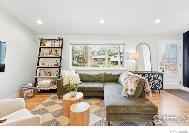 1670 Linden Ave, Boulder, CO 80304 - living area with wood finished floors, baseboards, and recessed lighting