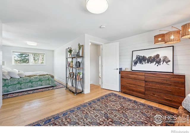 1670 Linden Ave, Boulder, CO 80304 - bedroom featuring wood finished floors and wooden walls