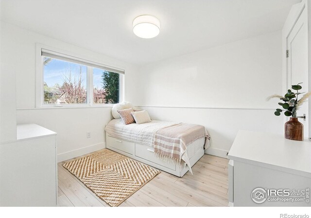 1670 Linden Ave, Boulder, CO 80304 - bedroom with light wood-type flooring and baseboards