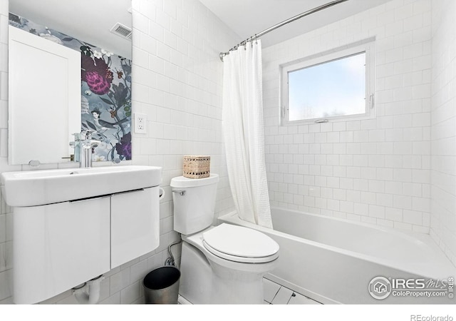 1670 Linden Ave, Boulder, CO 80304 - full bath with toilet, vanity, shower / bath combo with shower curtain, and tile walls