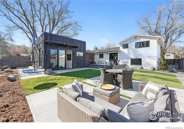 1670 Linden Ave, Boulder, CO 80304 - view of patio with an outdoor living space, an outbuilding, and outdoor dining space