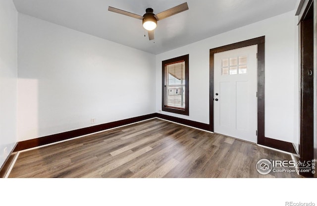 9571 Gray Ave, Carr, CO 80612 - entrance foyer with wood finished floors, baseboards, and ceiling fan