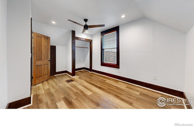 9571 Gray Ave, Carr, CO 80612 - unfurnished bedroom with light wood-style floors, vaulted ceiling, baseboards, recessed lighting, and a ceiling fan