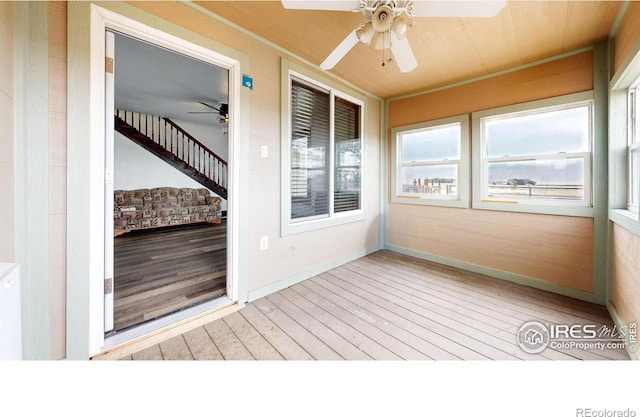 9571 Gray Ave, Carr, CO 80612 - unfurnished sunroom featuring ceiling fan