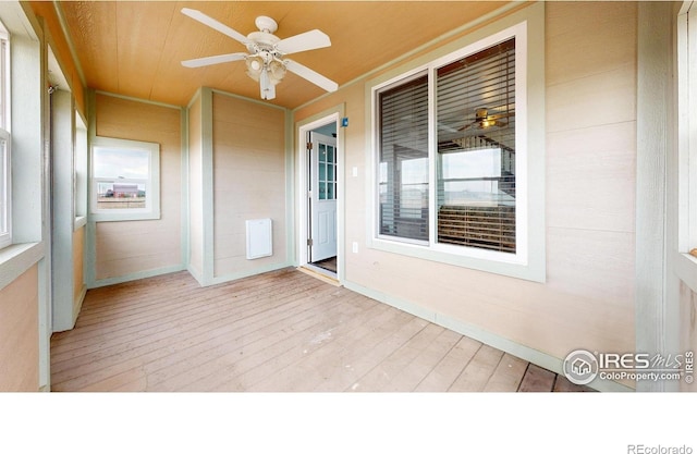 9571 Gray Ave, Carr, CO 80612 - unfurnished sunroom featuring healthy amount of natural light
