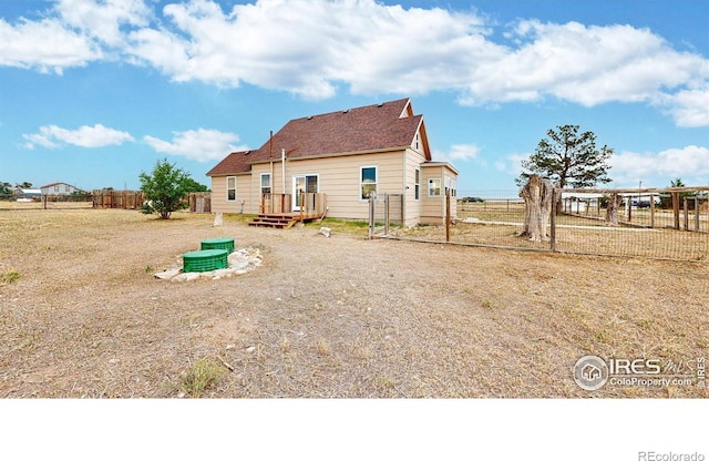 9571 Gray Ave, Carr, CO 80612 - view of rear view of house