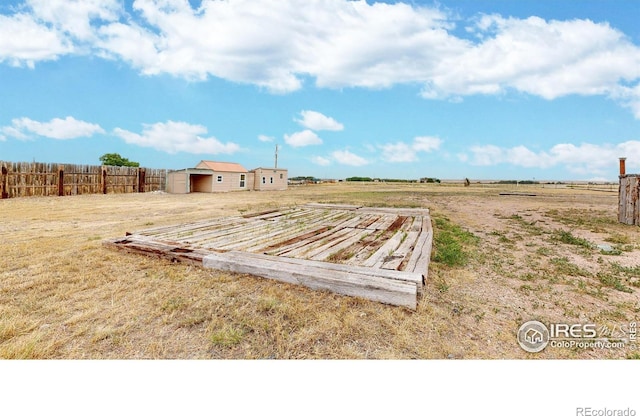 9571 Gray Ave, Carr, CO 80612 - view of yard featuring an outbuilding and a view of rural / pastoral area