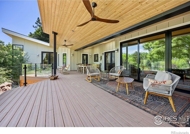 1579 W Costilla Pl, Littleton, CO 80120 - wooden terrace featuring a ceiling fan and outdoor dining area
