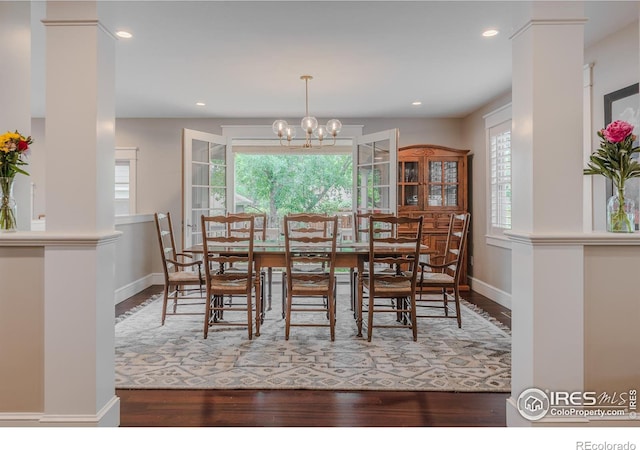 1816 Mariposa Ave, Boulder, CO 80302 - dining area with plenty of natural light, wood finished floors, a chandelier, baseboards, and recessed lighting