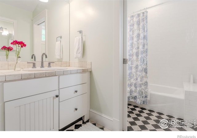 1816 Mariposa Ave, Boulder, CO 80302 - full bathroom with vanity, shower / tub combo with curtain, and baseboards