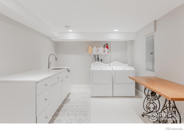 1816 Mariposa Ave, Boulder, CO 80302 - laundry area with washer and clothes dryer, electric panel, a sink, baseboards, and recessed lighting