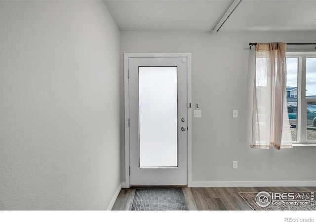 403 Pony Express Trl, Ault, CO 80610 - doorway with wood finished floors and baseboards