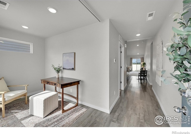 403 Pony Express Trl, Ault, CO 80610 - hall with wood finished floors, recessed lighting, and baseboards