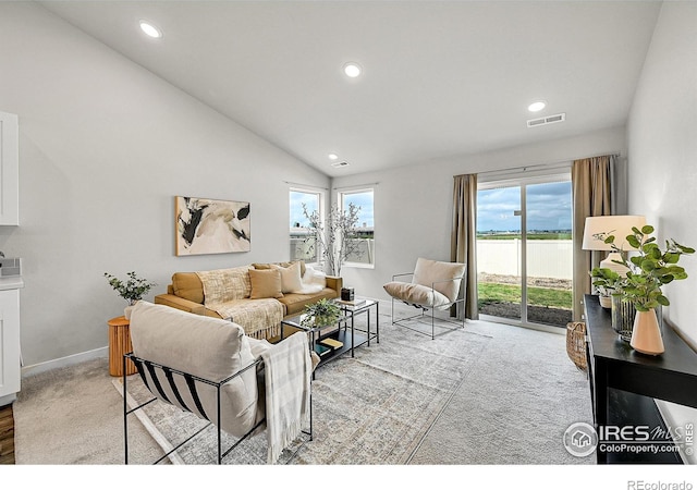 403 Pony Express Trl, Ault, CO 80610 - living room featuring recessed lighting, baseboards, and vaulted ceiling