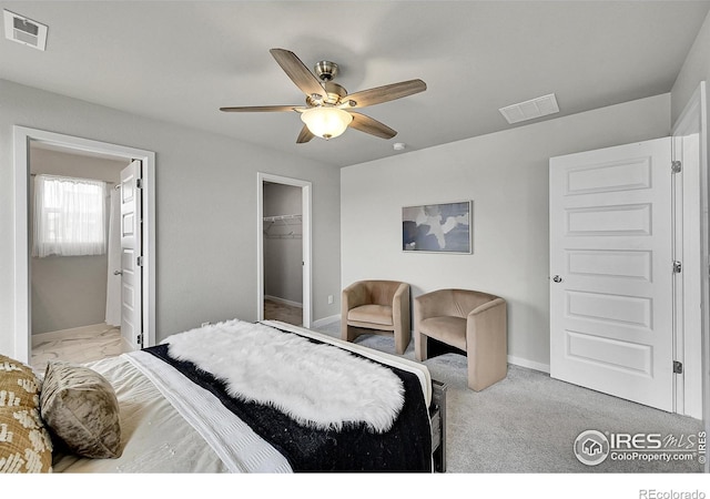 403 Pony Express Trl, Ault, CO 80610 - bedroom featuring baseboards, ceiling fan, a closet, and a walk in closet