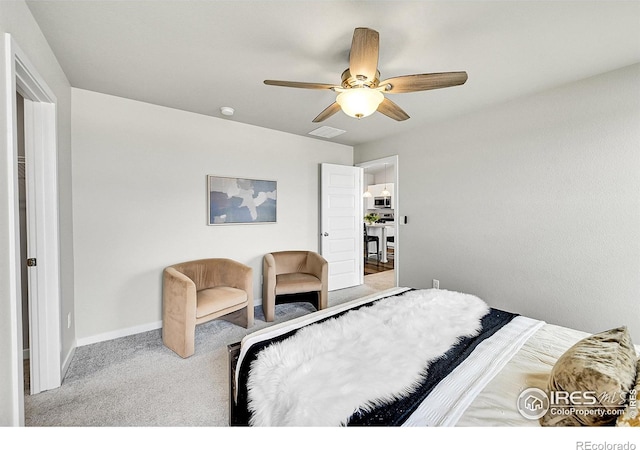 403 Pony Express Trl, Ault, CO 80610 - bedroom with carpet floors, a ceiling fan, and baseboards