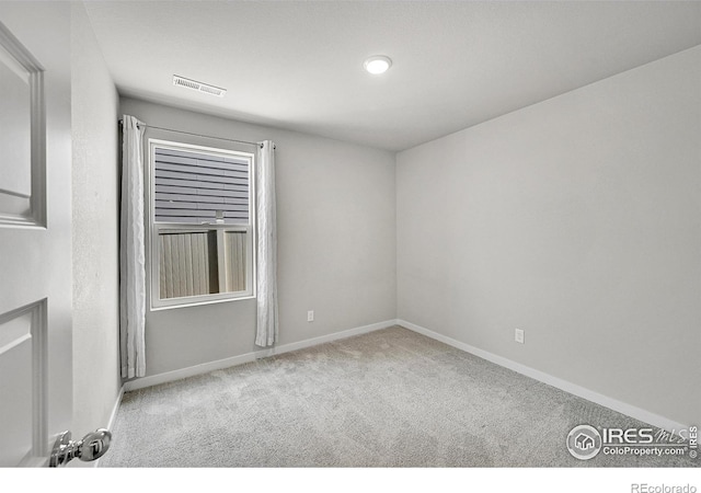 403 Pony Express Trl, Ault, CO 80610 - spare room with carpet floors and baseboards