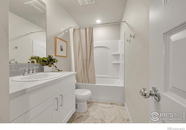 403 Pony Express Trl, Ault, CO 80610 - bathroom with vanity, shower / bathtub combination with curtain, toilet, and marble look tile flooring