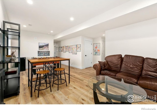 7061 Sage Meadows Dr, Wellington, CO 80549 - living area featuring light wood finished floors, baseboards, and recessed lighting