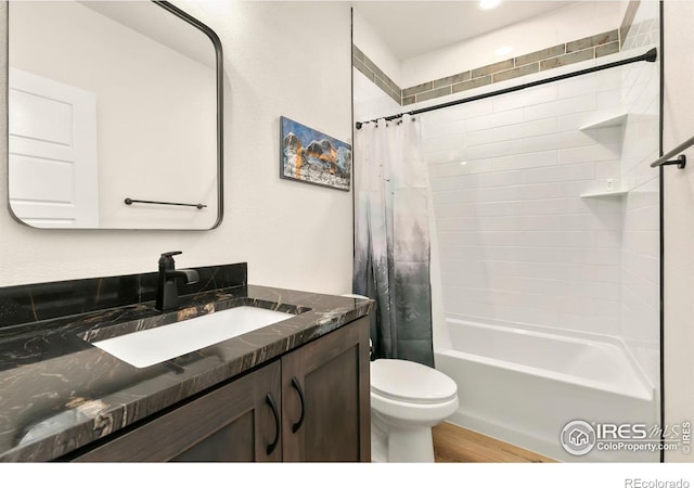 7061 Sage Meadows Dr, Wellington, CO 80549 - bathroom with vanity, wood finished floors, toilet, and shower / tub combo