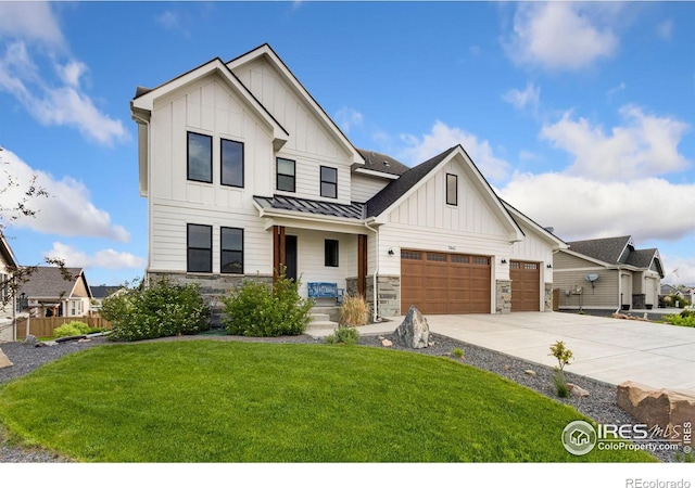 7061 Sage Meadows Dr, Wellington, CO 80549 - modern farmhouse style home featuring board and batten siding, stone siding, a standing seam roof, driveway, and metal roof