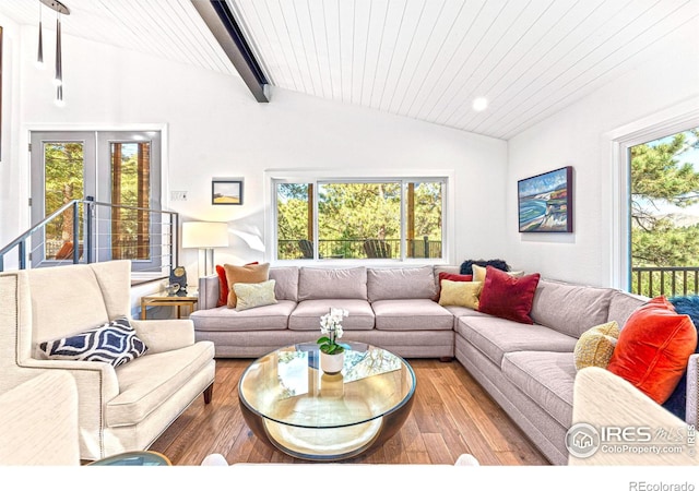 279 Green Meadow Ln, Boulder, CO 80302 - living area with healthy amount of natural light, hardwood / wood-style floors, wood ceiling, and french doors