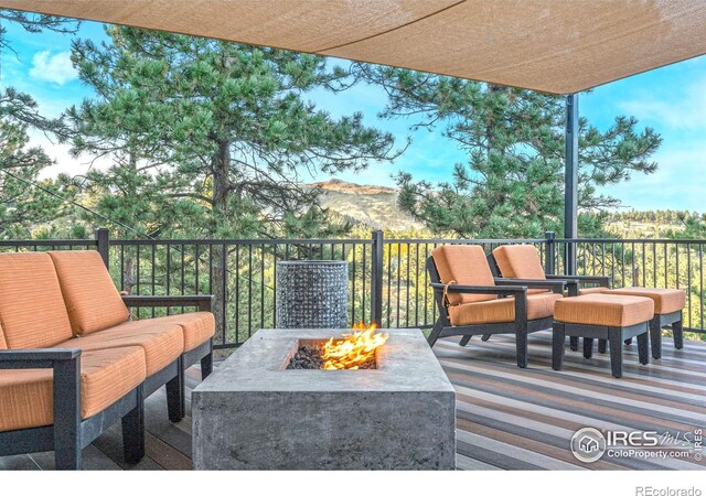 279 Green Meadow Ln, Boulder, CO 80302 - view of patio / terrace with a fire pit