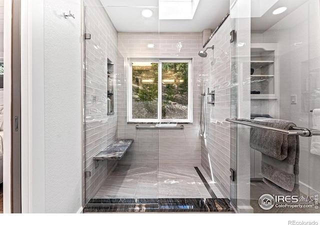 279 Green Meadow Ln, Boulder, CO 80302 - bathroom with a stall shower, marble finish floors, and recessed lighting