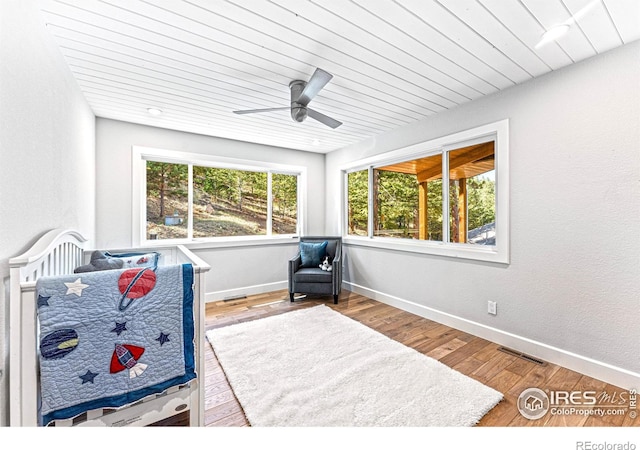 279 Green Meadow Ln, Boulder, CO 80302 - bedroom with wood finished floors, baseboards, a ceiling fan, and wooden ceiling