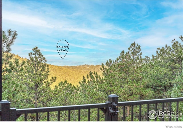 279 Green Meadow Ln, Boulder, CO 80302 - water view featuring a heavily wooded area