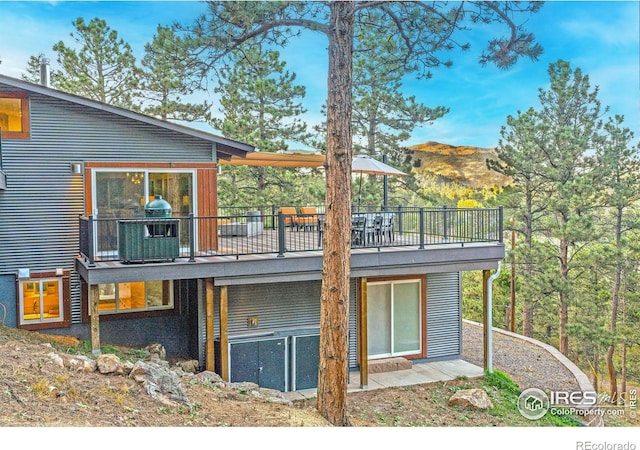 279 Green Meadow Ln, Boulder, CO 80302 - view of home's exterior with a deck with mountain view