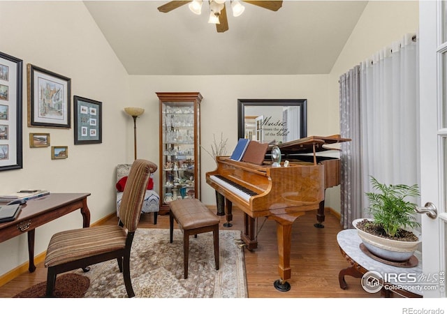 3023 39th Ave, Evans, CO 80620 - home office with lofted ceiling, wood finished floors, ceiling fan, and baseboards