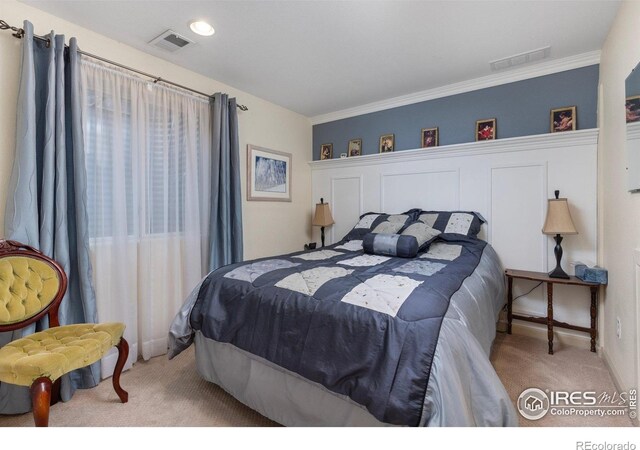 3023 39th Ave, Evans, CO 80620 - bedroom with carpet flooring, baseboards, and ornamental molding