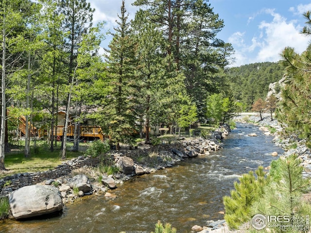 135 Canyon River Rd, Drake, CO 80515 - water view featuring a forest