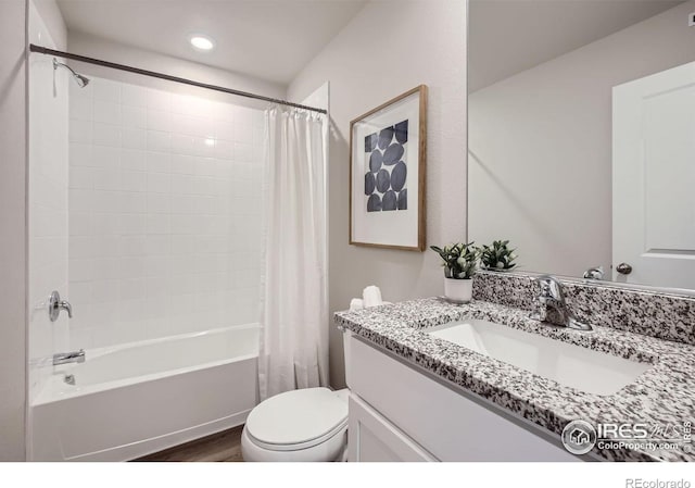 187 Robin Rd, Johnstown, CO 80534 - full bathroom with vanity, toilet, shower / tub combo with curtain, wood finished floors, and recessed lighting