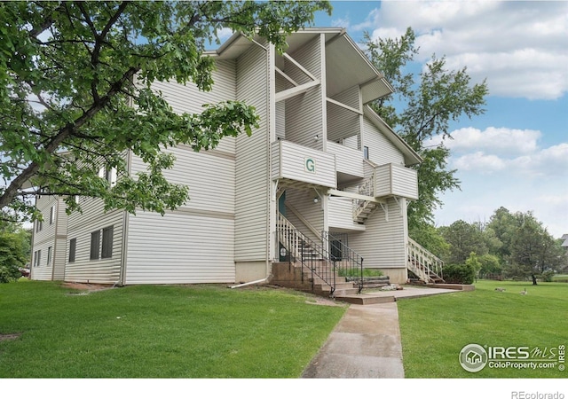 1705 Heatheridge Rd Unit G105, Fort Collins, CO 80526 - view of building exterior with stairway