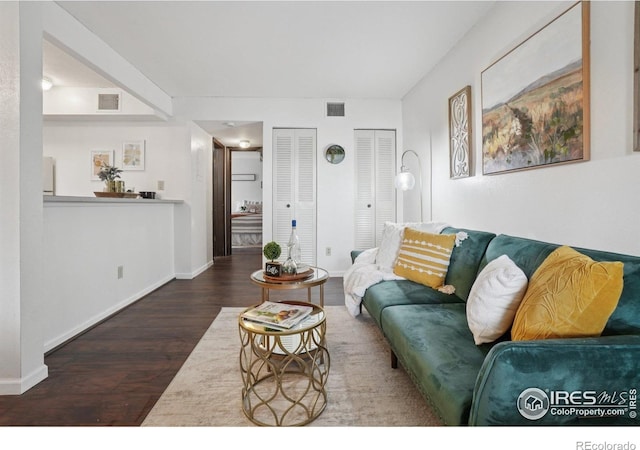 1705 Heatheridge Rd Unit G105, Fort Collins, CO 80526 - living area with wood finished floors and baseboards