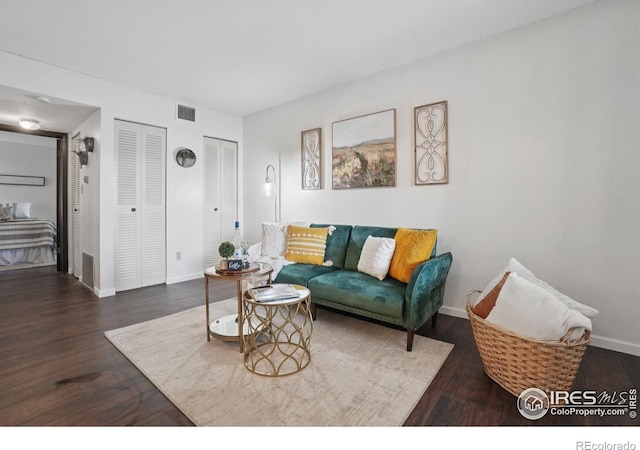1705 Heatheridge Rd Unit G105, Fort Collins, CO 80526 - living room with wood finished floors and baseboards