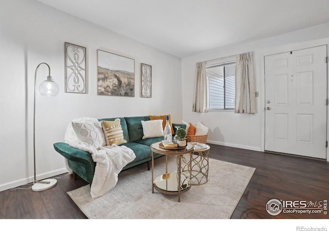 1705 Heatheridge Rd Unit G105, Fort Collins, CO 80526 - living area with baseboards and wood finished floors