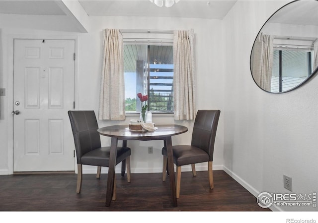 1705 Heatheridge Rd Unit G105, Fort Collins, CO 80526 - dining area featuring baseboards and wood finished floors