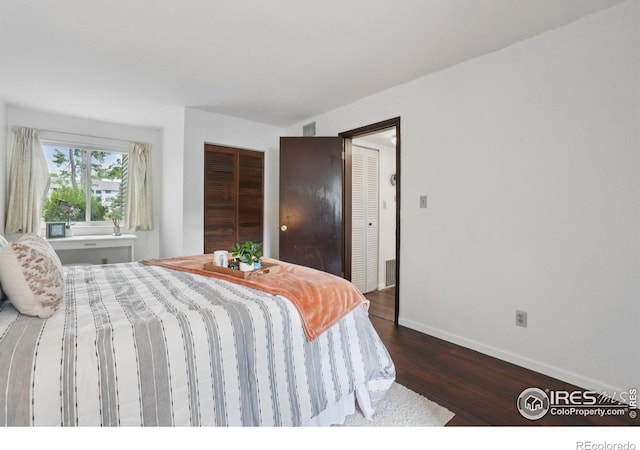 1705 Heatheridge Rd Unit G105, Fort Collins, CO 80526 - bedroom with wood finished floors and baseboards