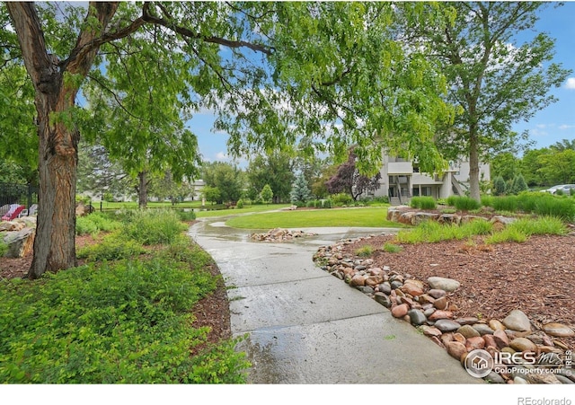1705 Heatheridge Rd Unit G105, Fort Collins, CO 80526 - surrounding community featuring a lawn